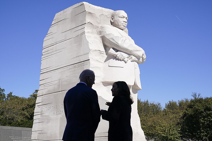 President Joe Biden and Vice President Kamala Harris stand together at the Martin Luther King, Jr. Memorial as they arrive to attend an event marking the 10th anniversary of the dedication of memorial in Washington, Thursday, Oct. 21, 2021. (Susan Walsh/AP, File)