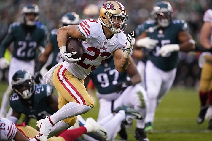 San Francisco 49ers running back Christian McCaffrey plays during the NFC Championship game on Sunday, Jan. 29, 2023, in Philadelphia. McCaffrey averaged 114.8 yards from scrimmage per game with 10 TDs in his 10 starts in San Francisco. (Matt Rourke/AP, File)
