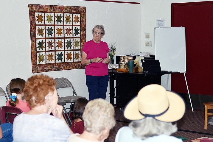 Presenter Natalie Stewart-Smith discusses the Little House Lady (Laura Ingalls Wilder) at the Chino Valley library on Friday, Aug. 25, 2023. (Jesse Bertel/Review)
