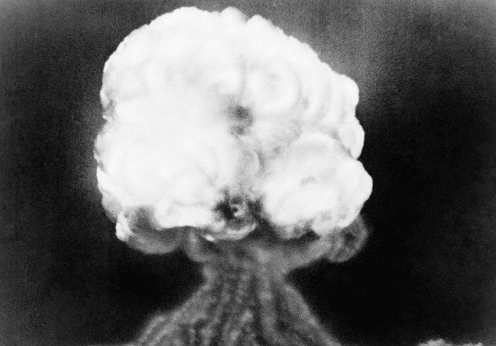 This July 16, 1945, file photo, shows the mushroom cloud of the first atomic explosion at Trinity Test Site near Alamagordo, N.M. New Mexico Attorney General Raúl Torrez and top prosecutors from several other states and the District of Columbia are uniting in support of efforts to compensate people sickened by exposure to radiation during nuclear weapons testing. (AP Photo/File)